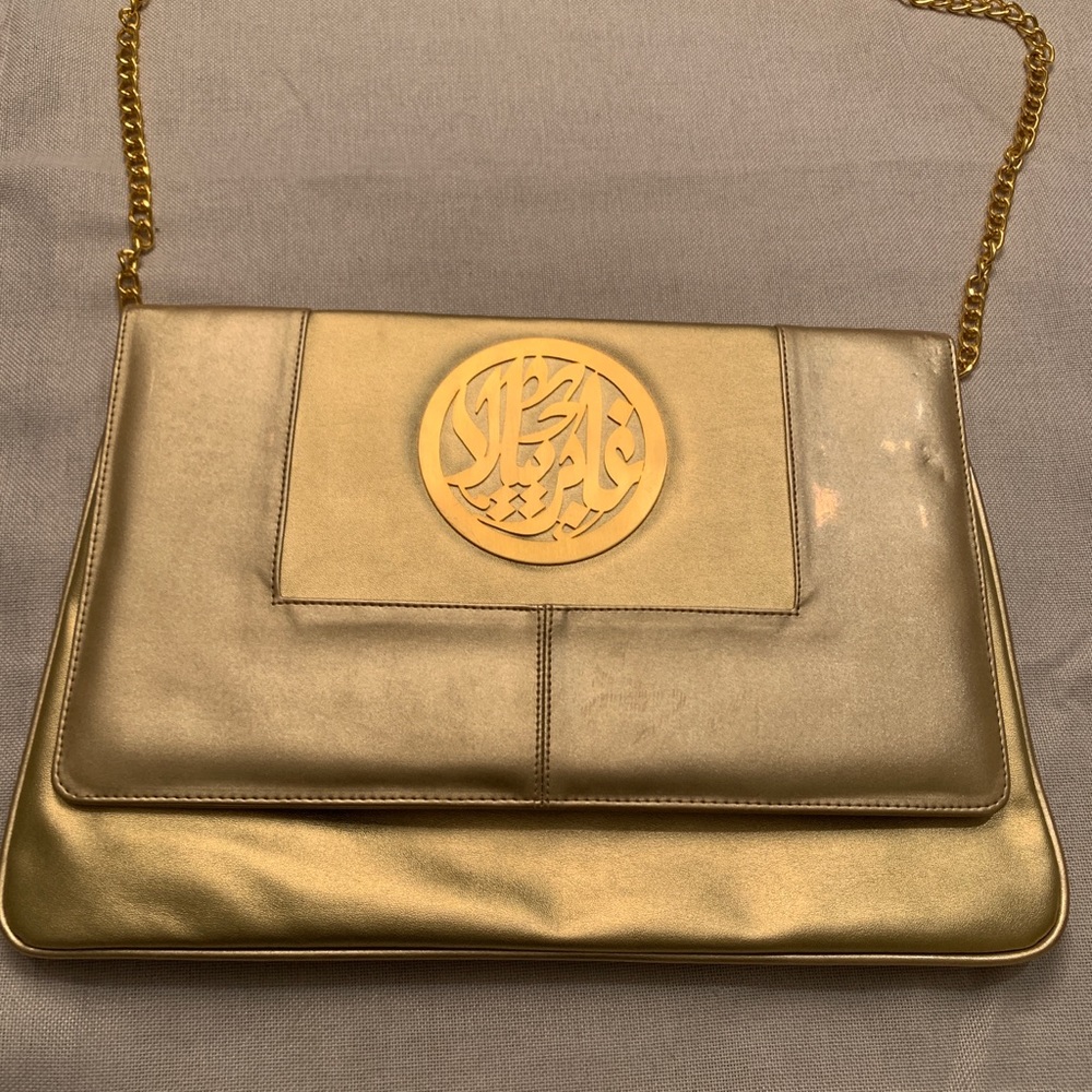 Designer gold clutch/ envelope handbag bag